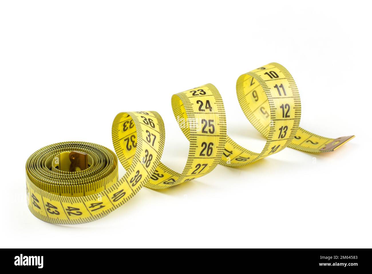 Measuring tape of tailor with indicators in form of centimeters. Yellow  rolled measuring tape isolated on white background Stock Photo - Alamy