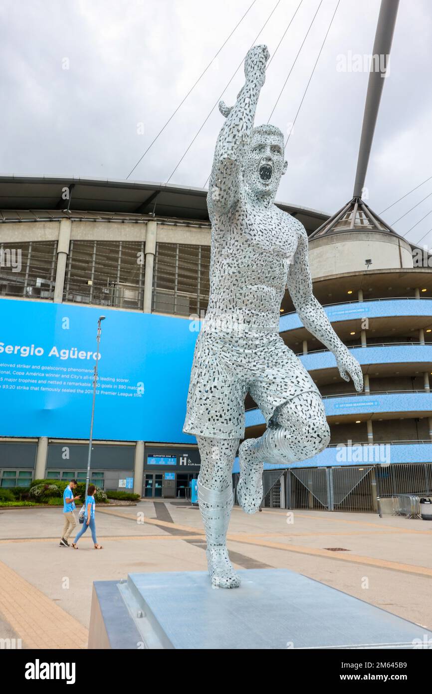 Classic,iconic,image,of,Sergio Aguero,Argentina,footballer,when, Manchester City,won,Premiership,statue,at,Etihad Stadium,Manchester City,Manchester City football club,fans,Manchester,city,city centre,center,North West, England,North West England,English,English City,Levelling Up,Greater Manchester, GB,Great Britain,Britain,British,UK,United Kingdom,English city, Stock Photo