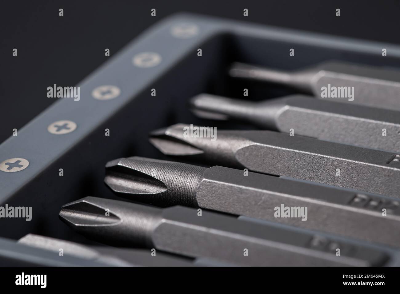 Set of bits for screwdriver. Metal bits for screwdriver. Tool set for