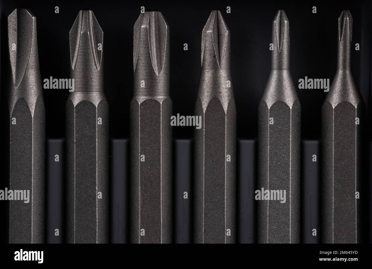 Set of bits for screwdriver. Metal bits for screwdriver. Tool set for