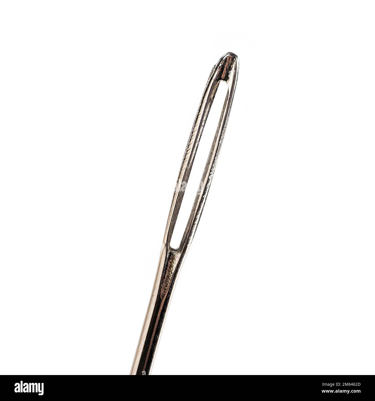 Macro of a needle, needle's eye with isolated on white background focus stack image. Stock Photo