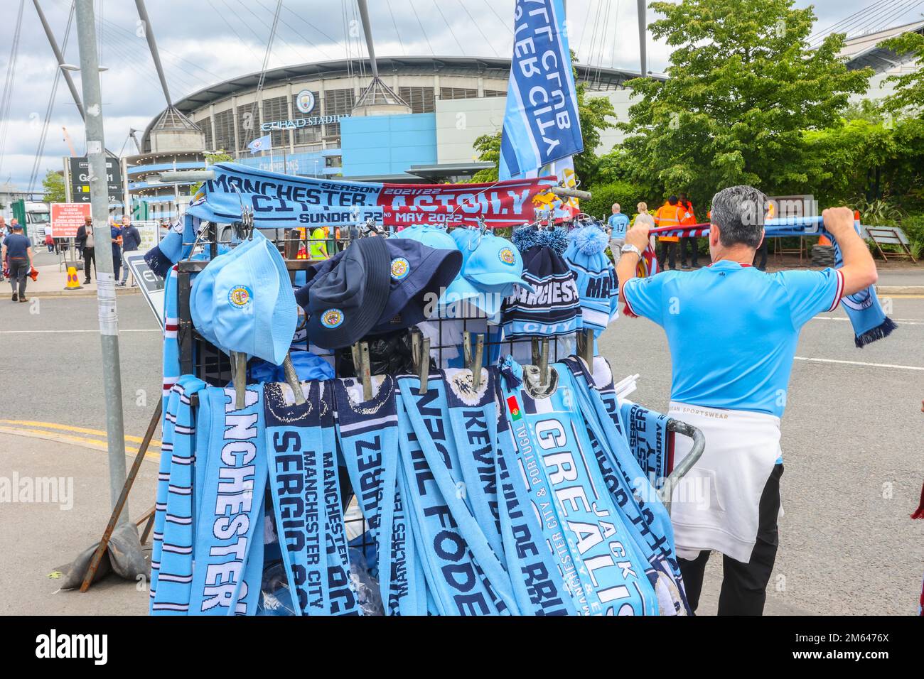 Half and Half scarf,scarves,Etihad Stadium,Manchester City,Manchester City football club,fans,Manchester,city,city centre,center,North West, England,North West England,English,English City,Levelling Up,Greater Manchester, GB,Great Britain,Britain,British,UK,United Kingdom,English city, Stock Photo