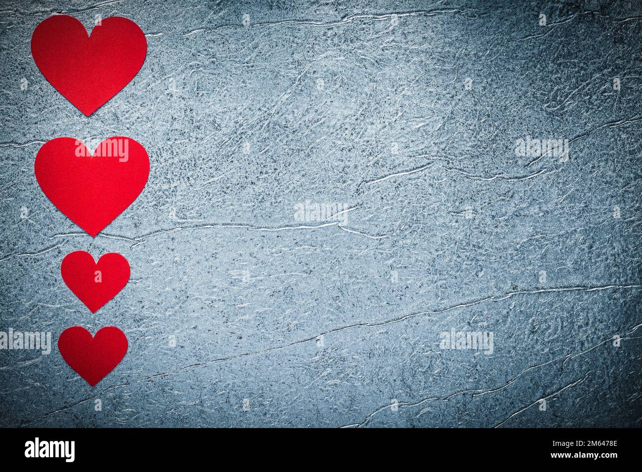 Set of red paper hearts on metallic background Valentine card Stock ...