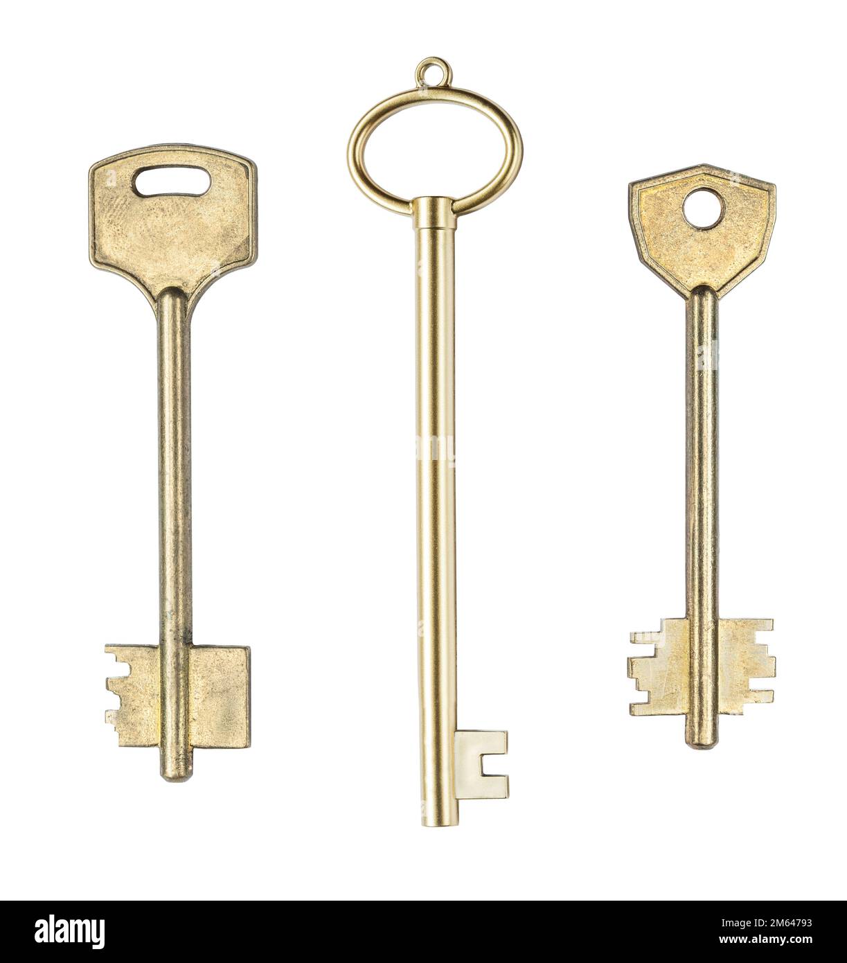 set of three brass house doors keys isolated on white background Stock Photo
