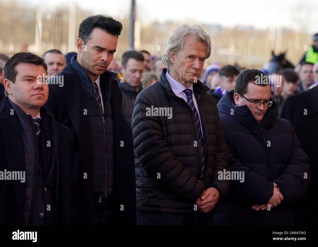 Left to right, Rangers board members Ross Wilson, James Bisgrove, Alastair Johnston and Graeme Park during a short service in memory of those who died in the Ibrox Disaster, 52 years ago today, and also in other tragedies at the stadium, before the cinch Premiership match at Ibrox Stadium, Glasgow. Picture date: Monday January 2, 2023. Stock Photo