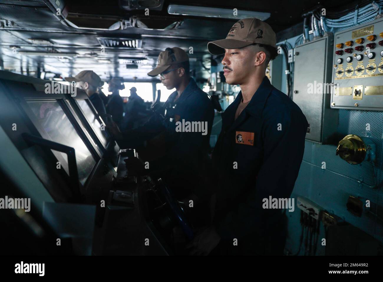 SOUTH CHINA SEA (March 31, 2022) Seaman Everett Rucker, front, from