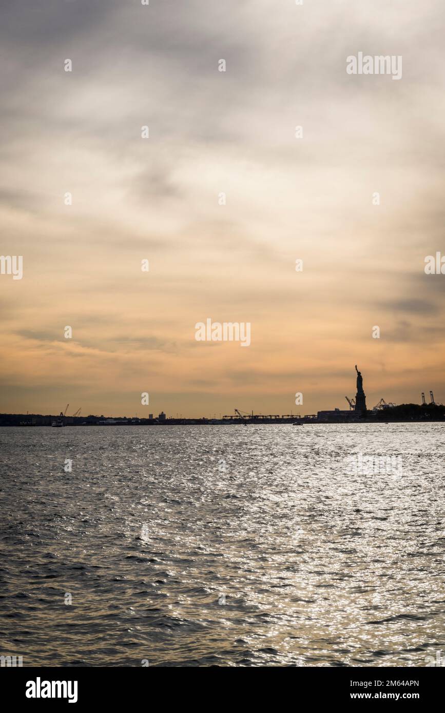 View of Ellis Island and Statue of Liberty from Battery Park, New York