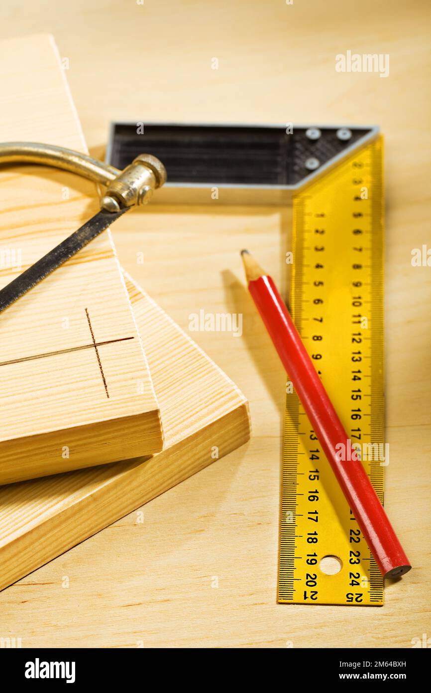 boards and pencil with ruller saw Stock Photo - Alamy