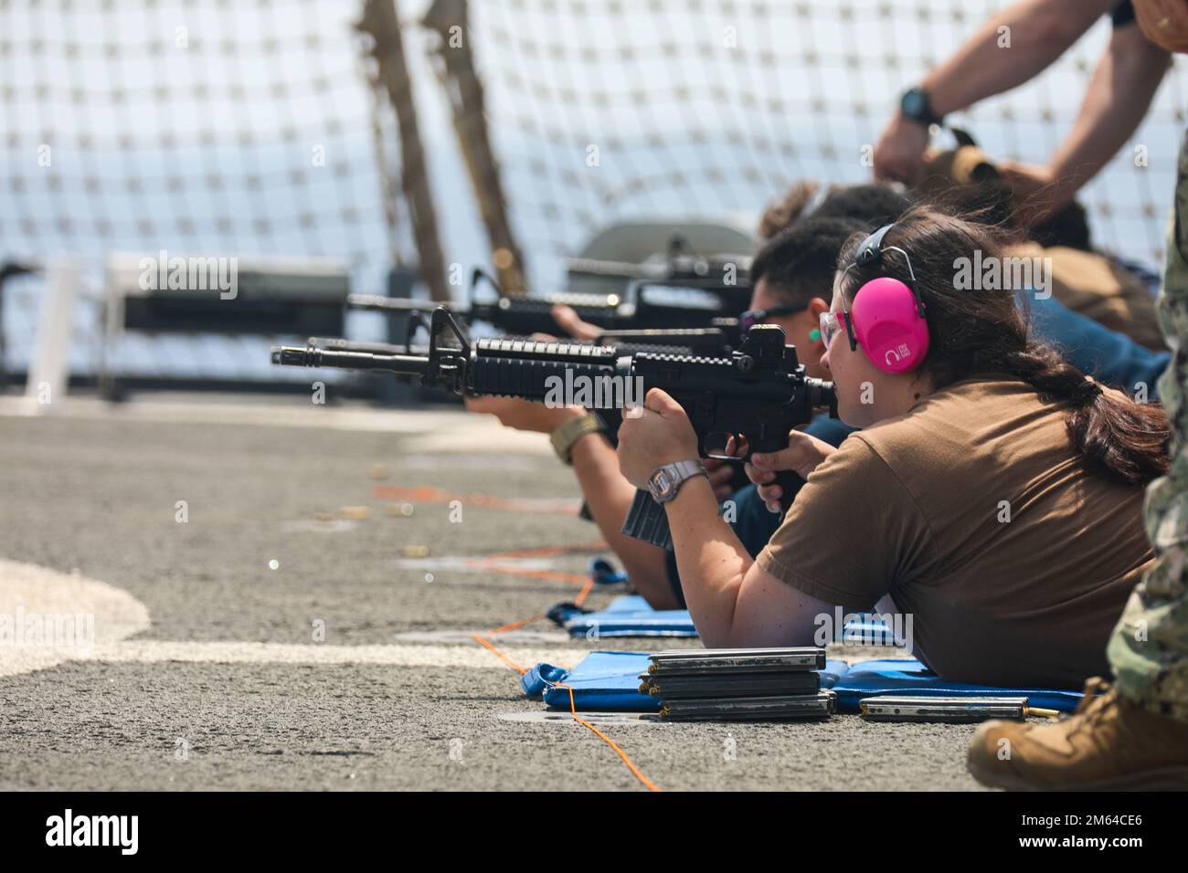 220331-N-CS075-1003 RED SEA (March 31, 2022) Sailors fire M4 rifles ...