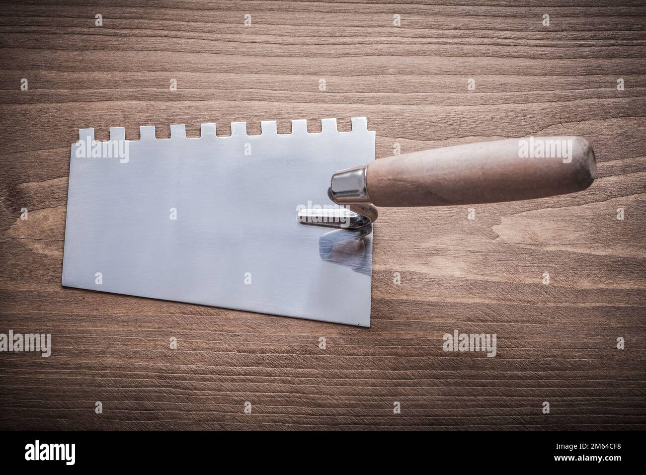 steel putty knife with wooden handle Stock Photo Alamy