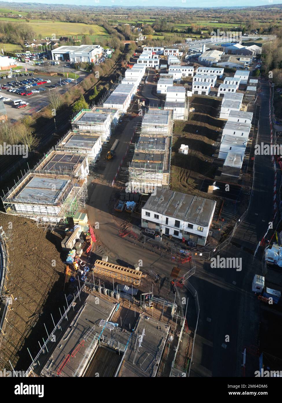 Aerial view of new build modular homes under construction on a former