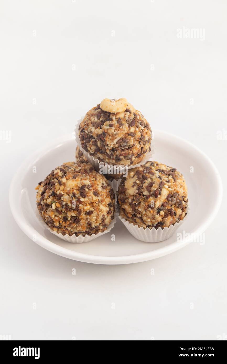 Flaxseed And Sesame Ladoo Also Known As Alsi Til Badam Ladddu Or Ellu Unde Magic Laddoo Is Winter Special Immunity Boosting Sweet Balls Made Of Gur Or Stock Photo
