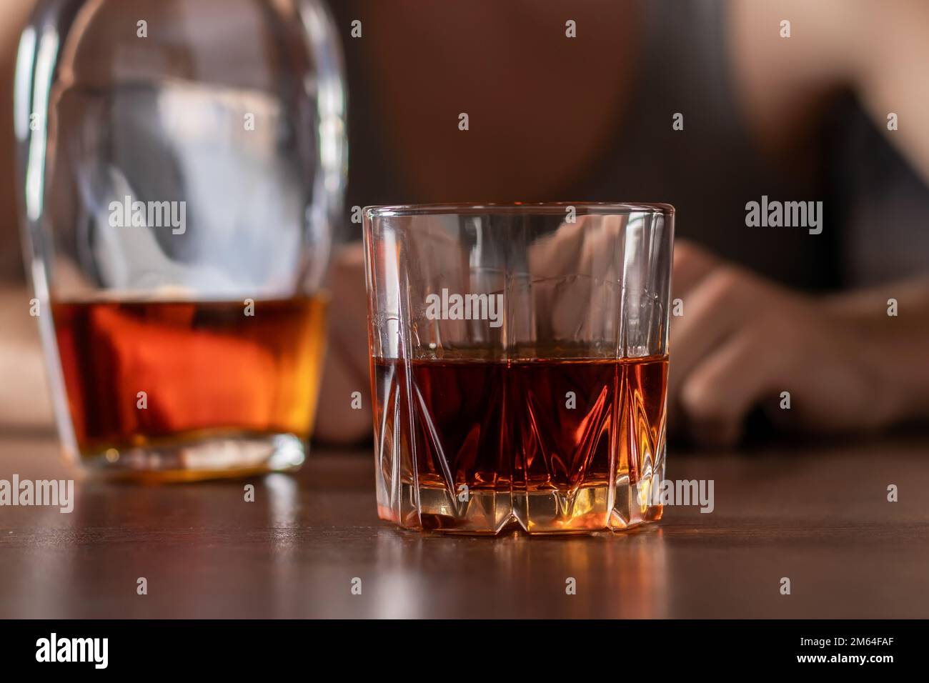 Alcoholism concept. Young man drinking alcohol too much. Alcoholic in a