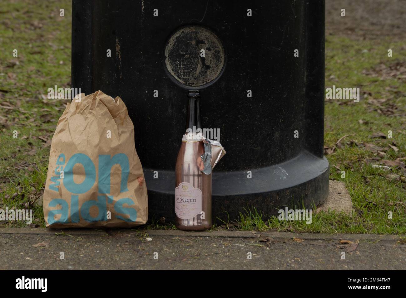Overflowing trash or litter bin after New Year's Eve parties in a