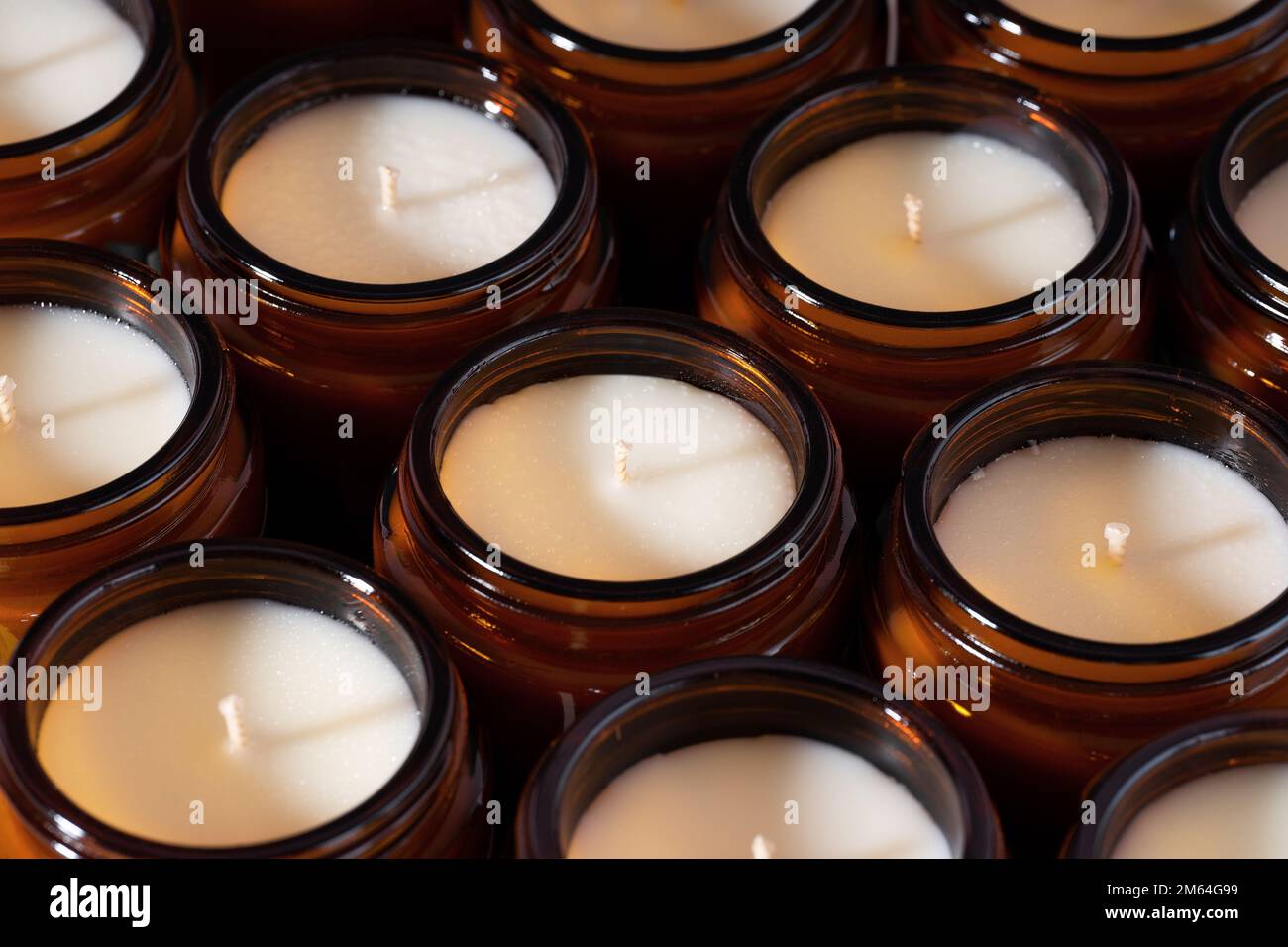 Group of Handmade Soy coconut wax candles in a Amber and opaque container, brown glass jar
