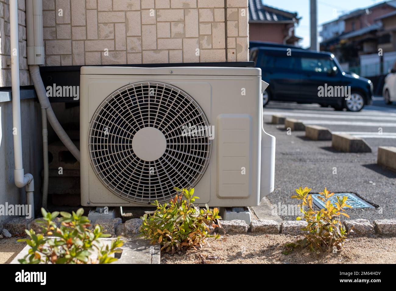 Air conditioner compressor outside the house Stock Photo Alamy