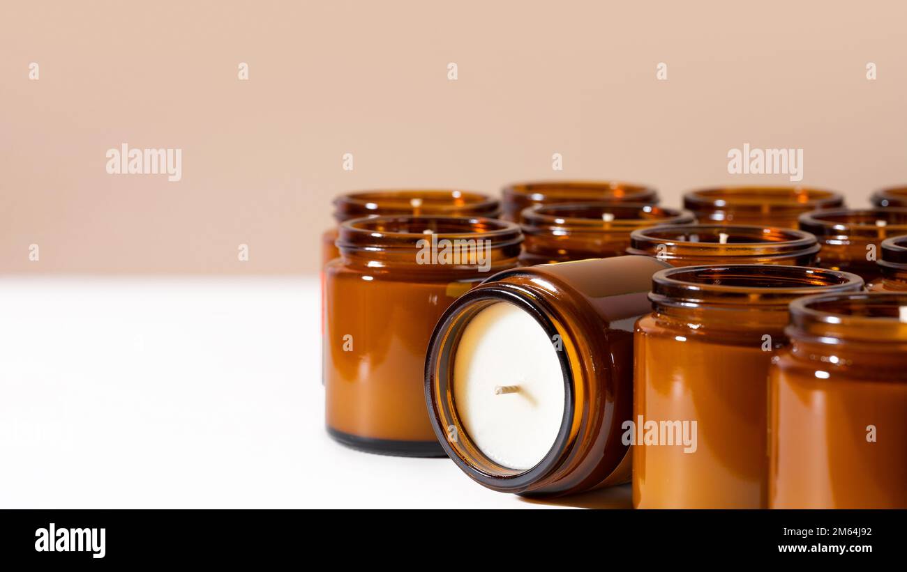 Group of Handmade Soy and coconut wax candles in a Amber and opaque
