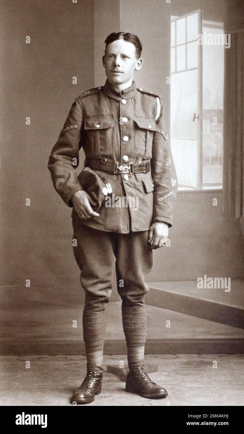 A First World War British lance corporal in a Fusilier regiment with a signallers trade badge, a long service good conduct stripe, and two overseas service stripes. 05/10/1918. Stock Photo