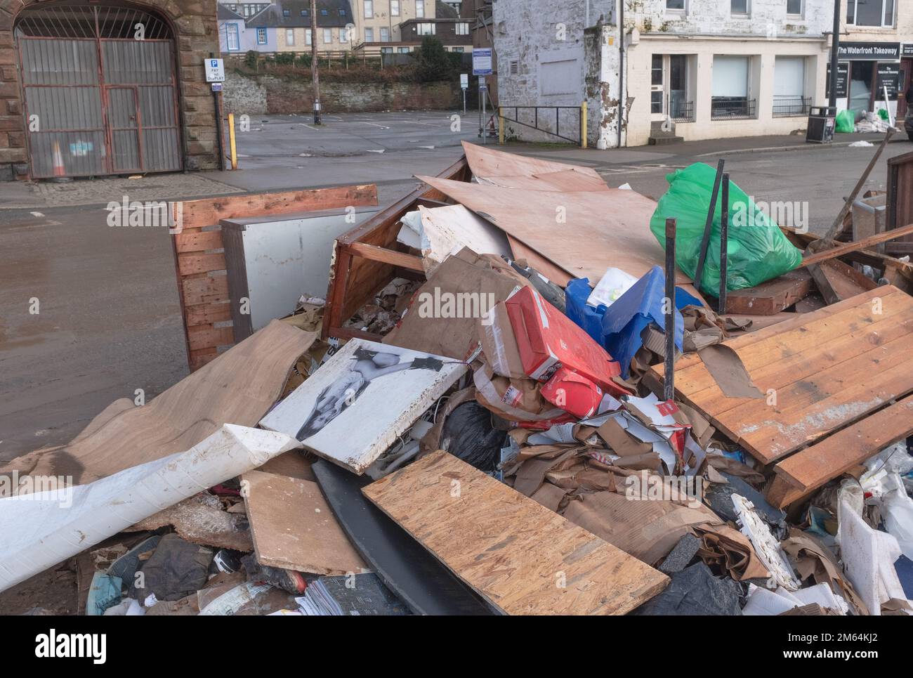 A closer view of the clear up on New Year’s day after huge flooding problems at The Whitesands in Dumfries, Scotland on the 30th December 2022. Stock Photo