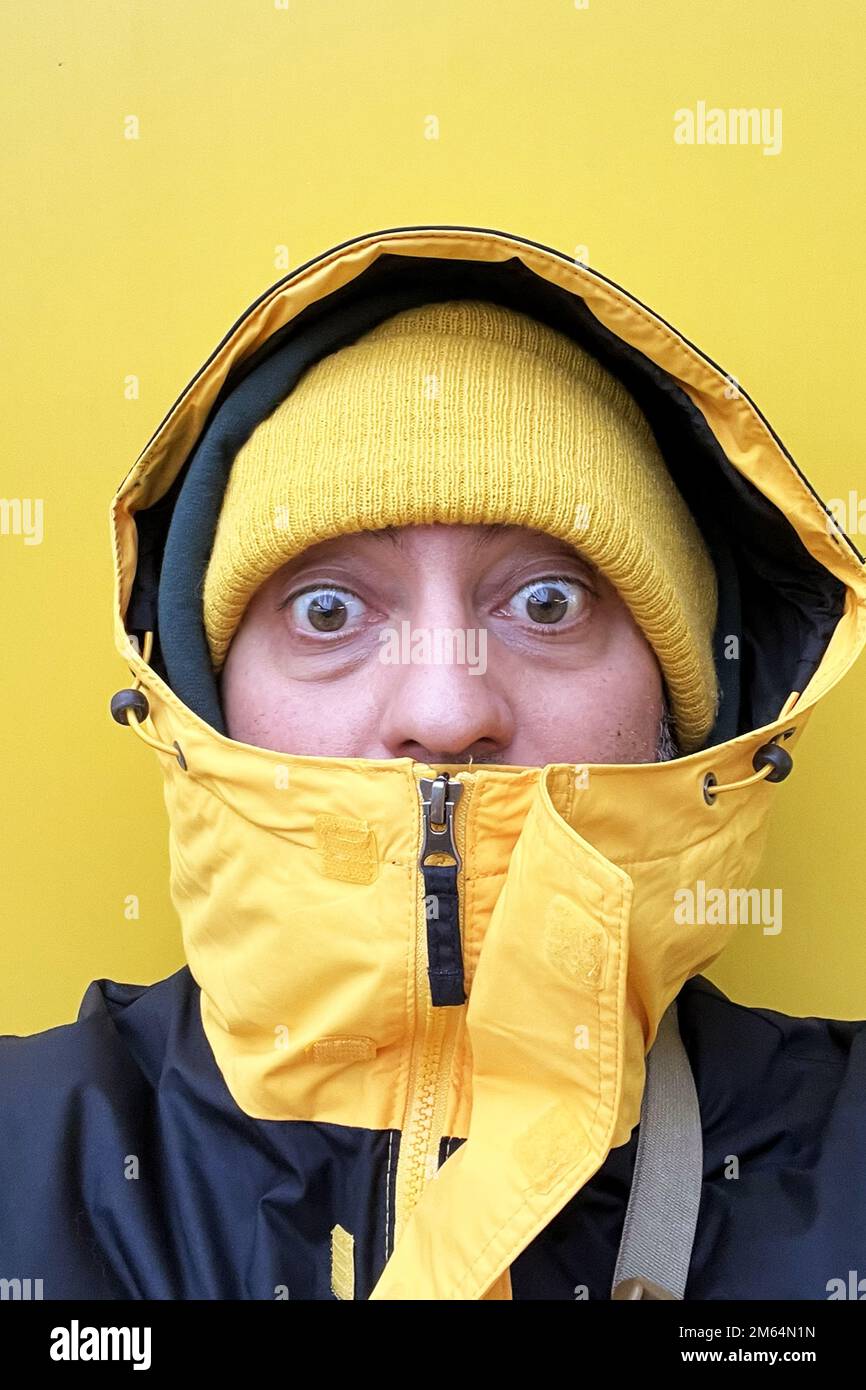 young man in winter jacket Stock Photo