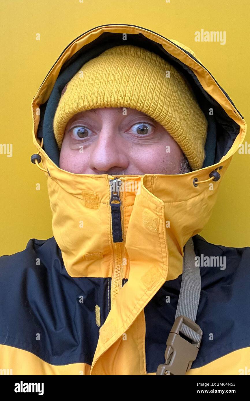 young man in winter jacket Stock Photo