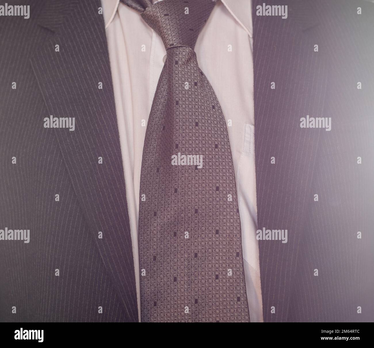Dark gray suit and tie on the businessman Stock Photo Alamy
