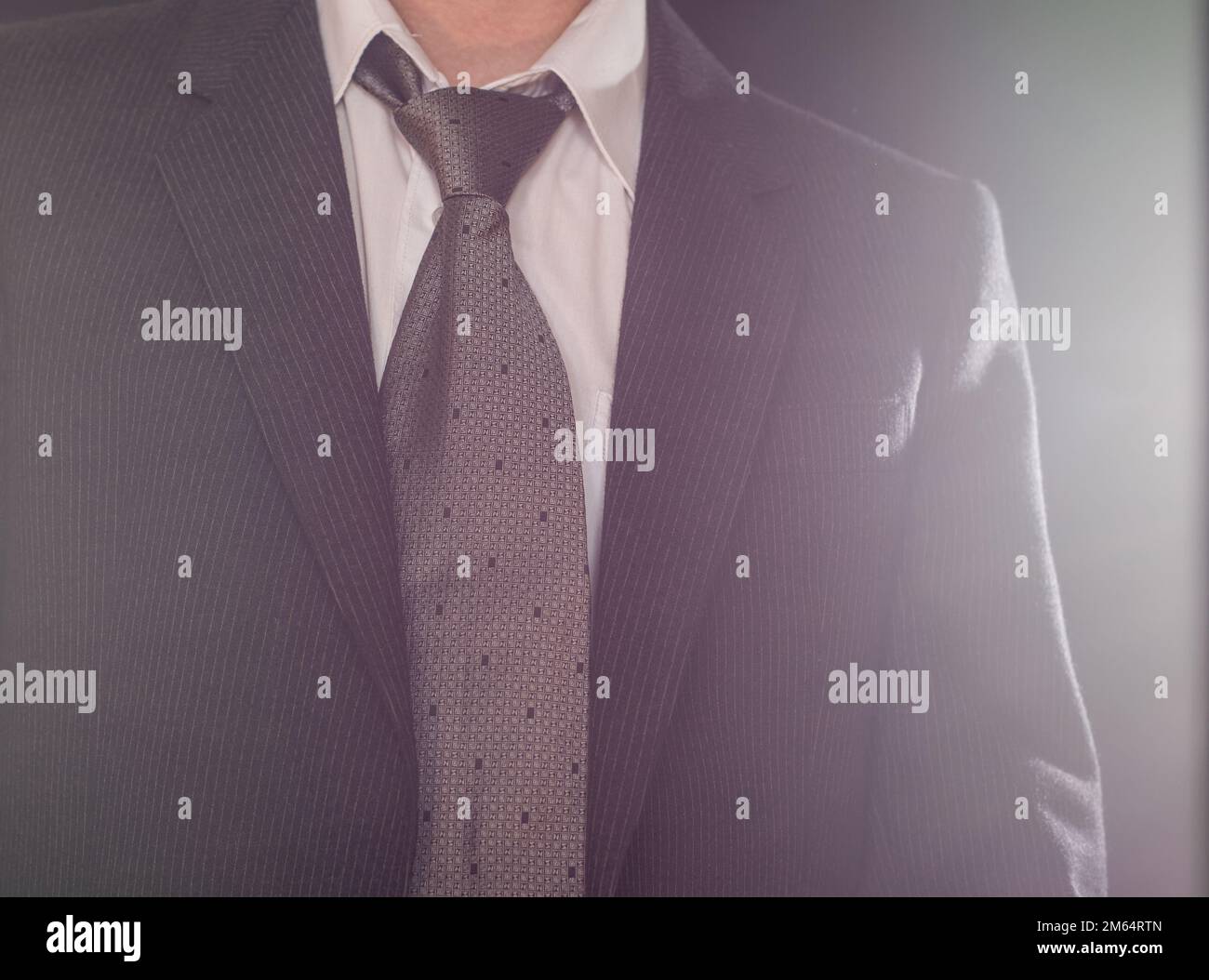 Dark gray suit and tie on the businessman Stock Photo - Alamy