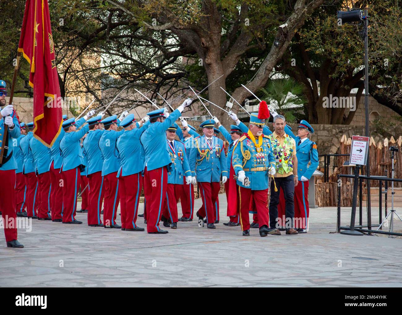 Members of the Texas Cavaliers Kings Knights present arms for Bart