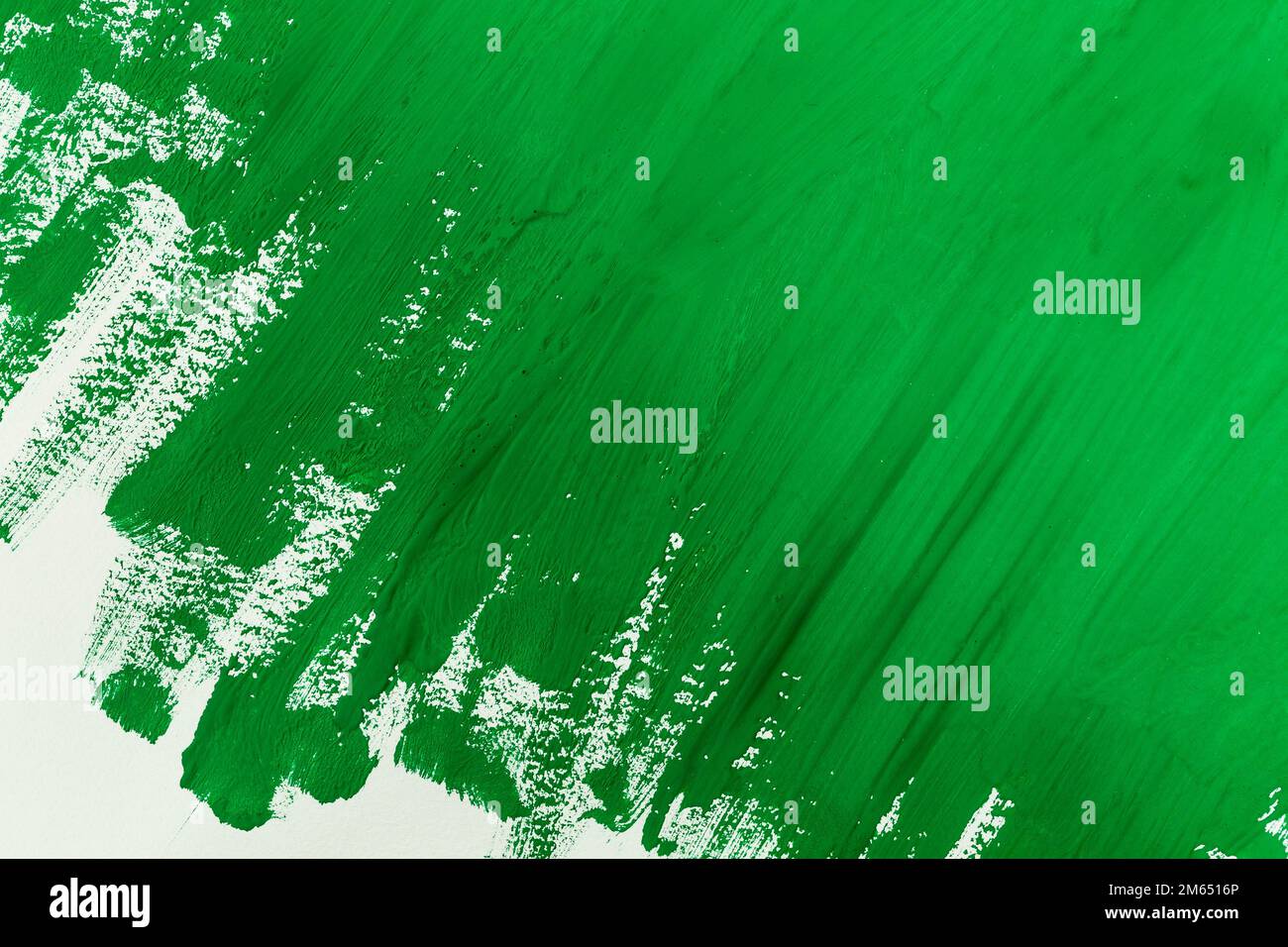 abstract green paint brush strokes watercolor background on white paper