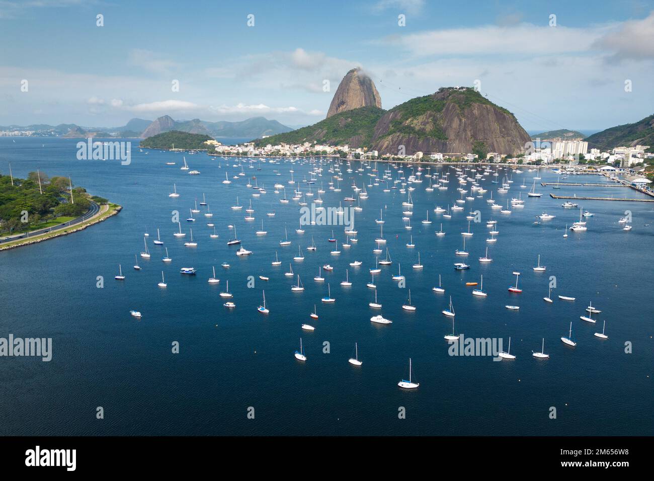 Premium Photo  Yacht club in urca bay of rio de janeiro and christ the  redeemer between the clouds leaning out