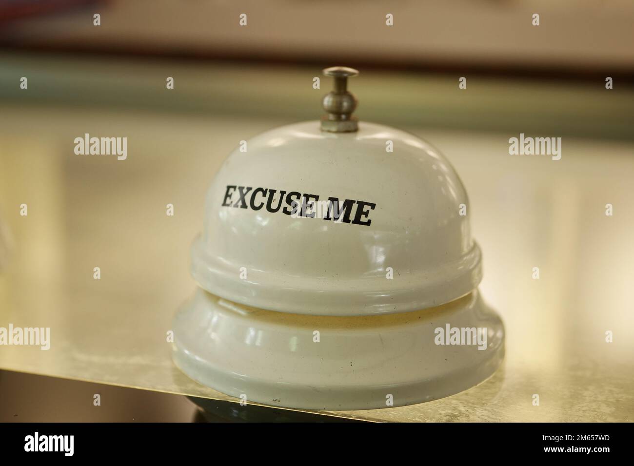 Hand ringing in service bell Stock Photo Alamy