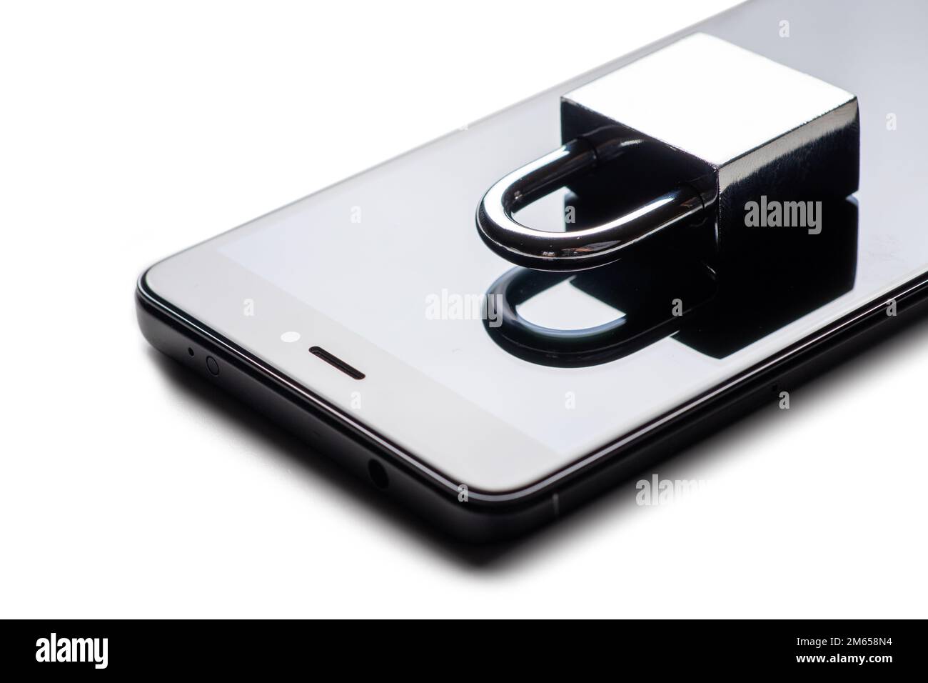 Technology security. Modern smartphone with padlock on white background ...
