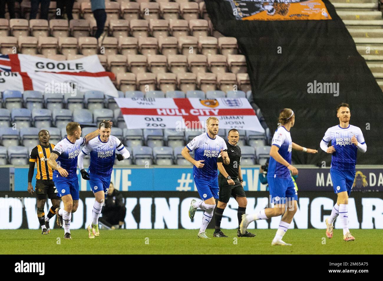 Nathan Broadhead 20 of Wigan Athletic celebrates his goal to make it 11 during the Sky Bet
