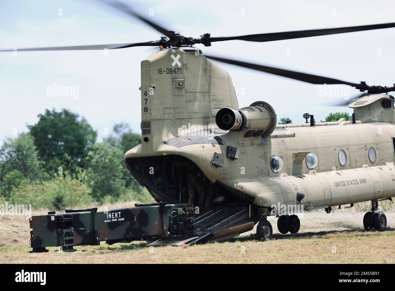 As a successful proof of concept, the 38th Air Defense Artillery Brigade conducted a resupply of PAC-3 MSE canisters utilized in the MIM-104 Patriot surface-to-air missile system via CH-47 piloted by the 3-25 Aviation Regiment during Balikatan 22 at Fort Magsaysay, Philippines, April 3, 2022. Balikatan, Tagalog for ‘shoulder-to-shoulder,’ is a long-standing bilateral exercise between the Philippines and the United States, highlighting the deep-rooted partnership between both countries. Balikatan 22 is the 37th iteration of the exercise and coincides with the 75th anniversary of U.S.-Philippine Stock Photo