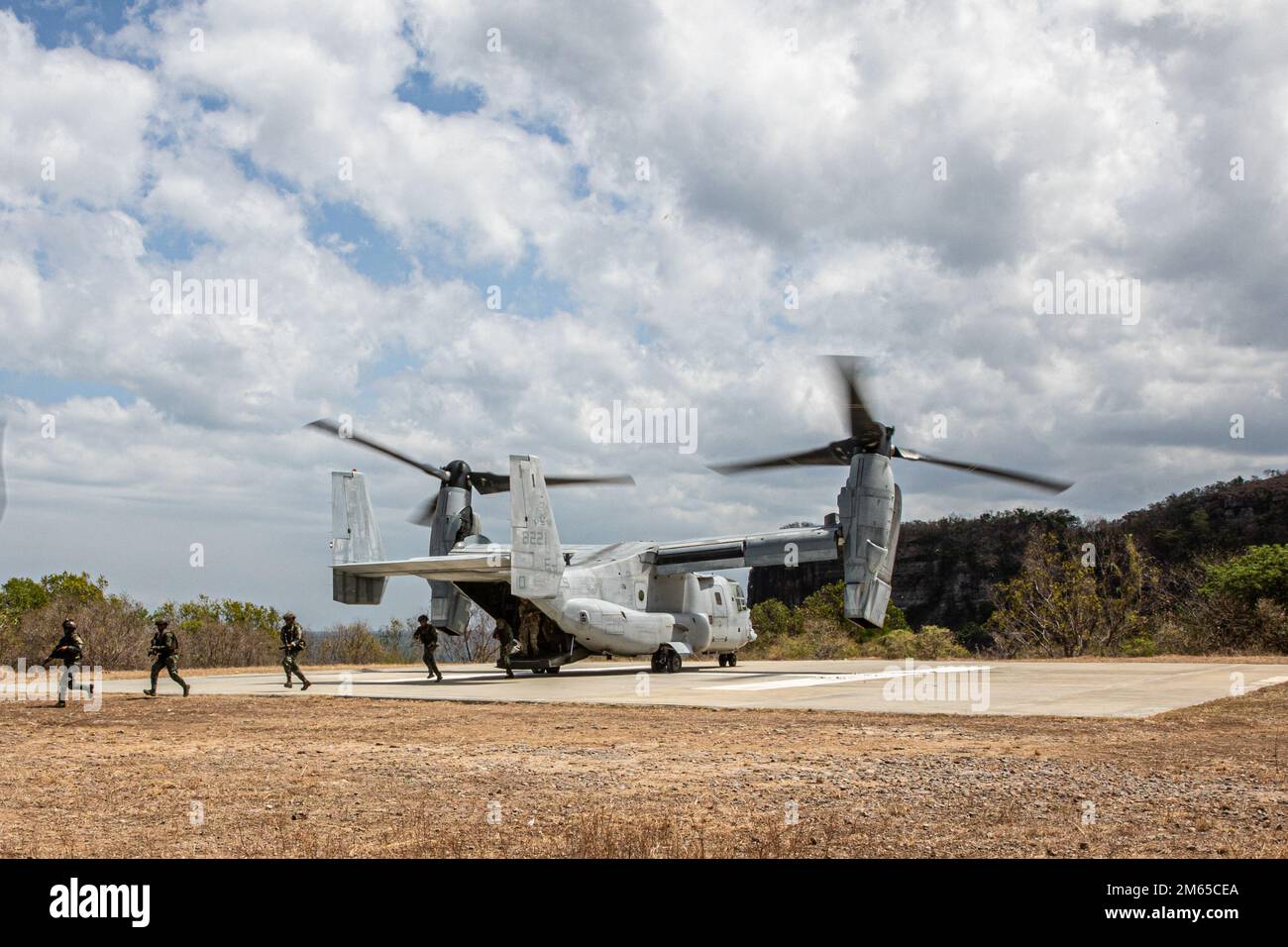 MANILA, Philippines- Philippine Marines and U.S. 1st Special Forces Group (Airborne) Soldiers exit an MV-22 Osprey during load and unload training April 3, 2022. These training opportunities contribute to regional stability, improve interoperability with our allies and partners, and contribute to strategic deterrence in the region, ensuring a free and open Indo-Pacific. Stock Photo