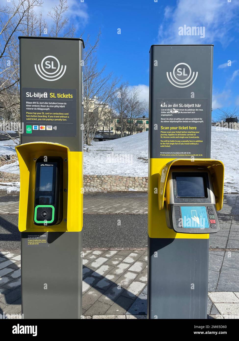 Train Ticket pass scanner machine box at railway station Stock Photo - Alamy