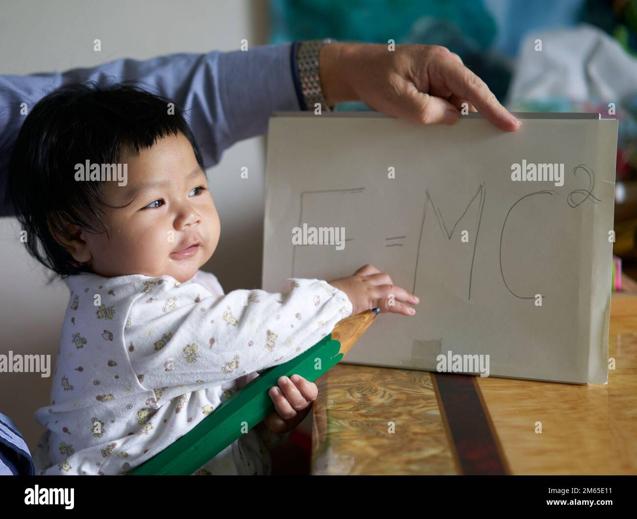 An adorable child, early learning and think big concept. Stock Photo