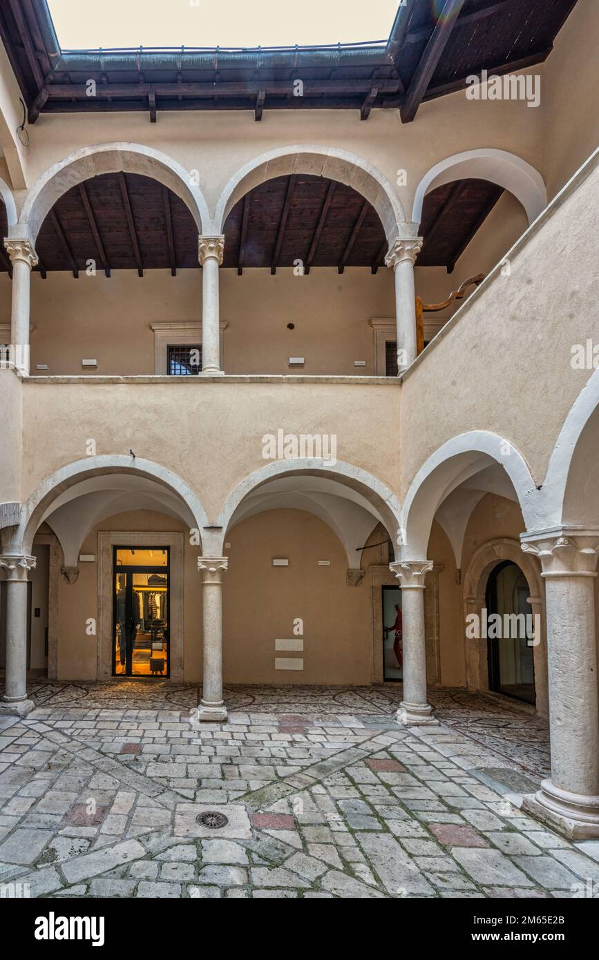Courtyard of the medieval building PALAZZO BURRI GATTI in L'Aquila, restored after the earthquake. L'Aquila, Abruzzo, Italy, Europe Stock Photo