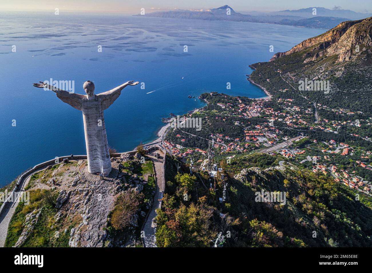 Aerial view of the statue of the Redeemer or Christ the Redeemer overlooking the Lucanian city of Maratea.Potenza province, Basilicata, Italy Stock Photo
