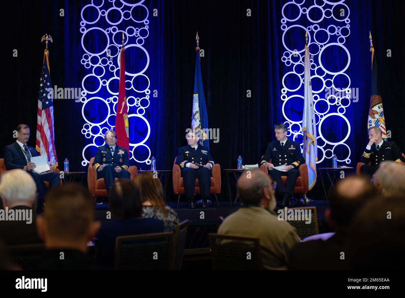 NATIONAL HARBOR, Md. (April 4, 2022) Ted Stevens, left, moderates the Geostrategic Importance of the Arctice event for speakers Adm. Linda Fagan, Vice Commandant, U.S. Coast Guard, left center, Rear Adm. Ewa Skoog Haslum, Chief of Navy, Swedish Navy, center, Mr. Chris Henderson, Deputy Commissioner, Canadian Coast Guard, right center, and Rear Adm. Marin la Cour-Andersen, Commander, Joint Arctic Command during the Sea-Air-Space 2022 Exposition. The Sea-Air-Space Exposition is an annual event that brings together key military decision makers, the U.S. defense industrial base and private-sector Stock Photo