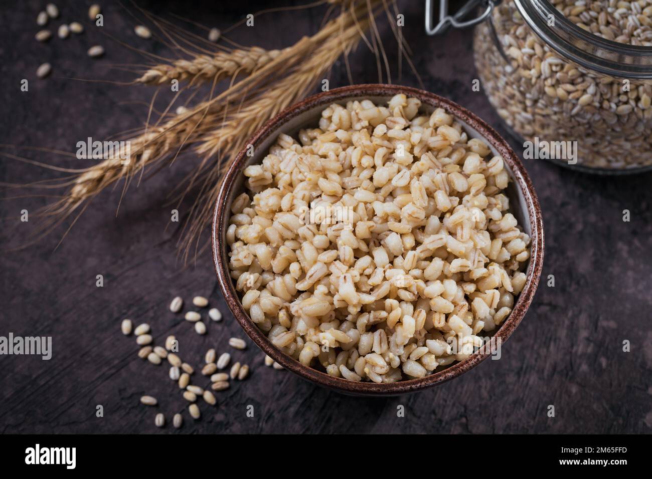 Bowl of cooked peeled barley grains porridge Stock Photo Alamy