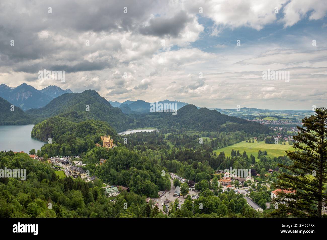 View of Hohenschwangau Castle, a 19th century palace and Alpsee lake located in the German town of Hohenschwangau, near the city of Füssen, Germany. Stock Photo