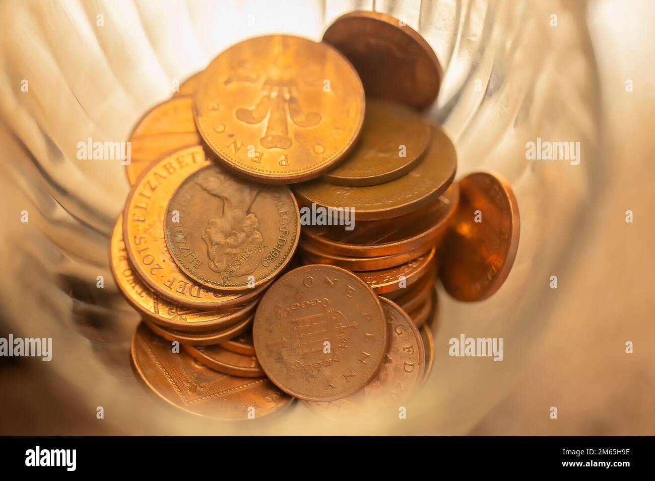 UK Currency shot in beautiful light with bokeh effect.British coins , spare change.Money of the United Kingdom Stock Photo