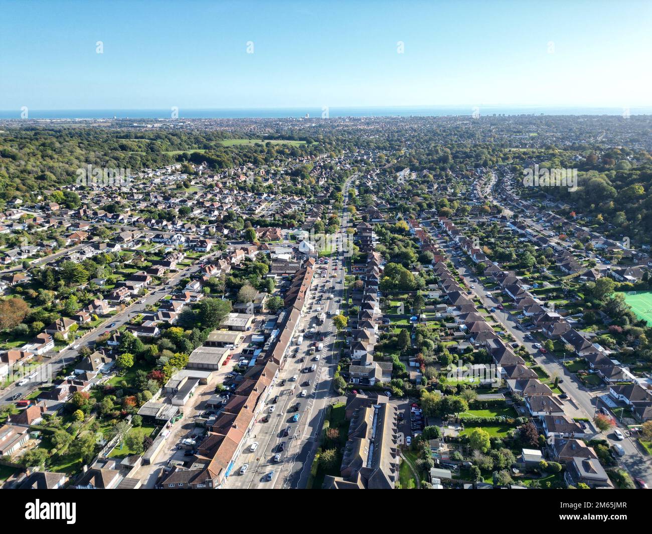 An aerial view of houses and trees in Findon Valley, Worthing, England ...