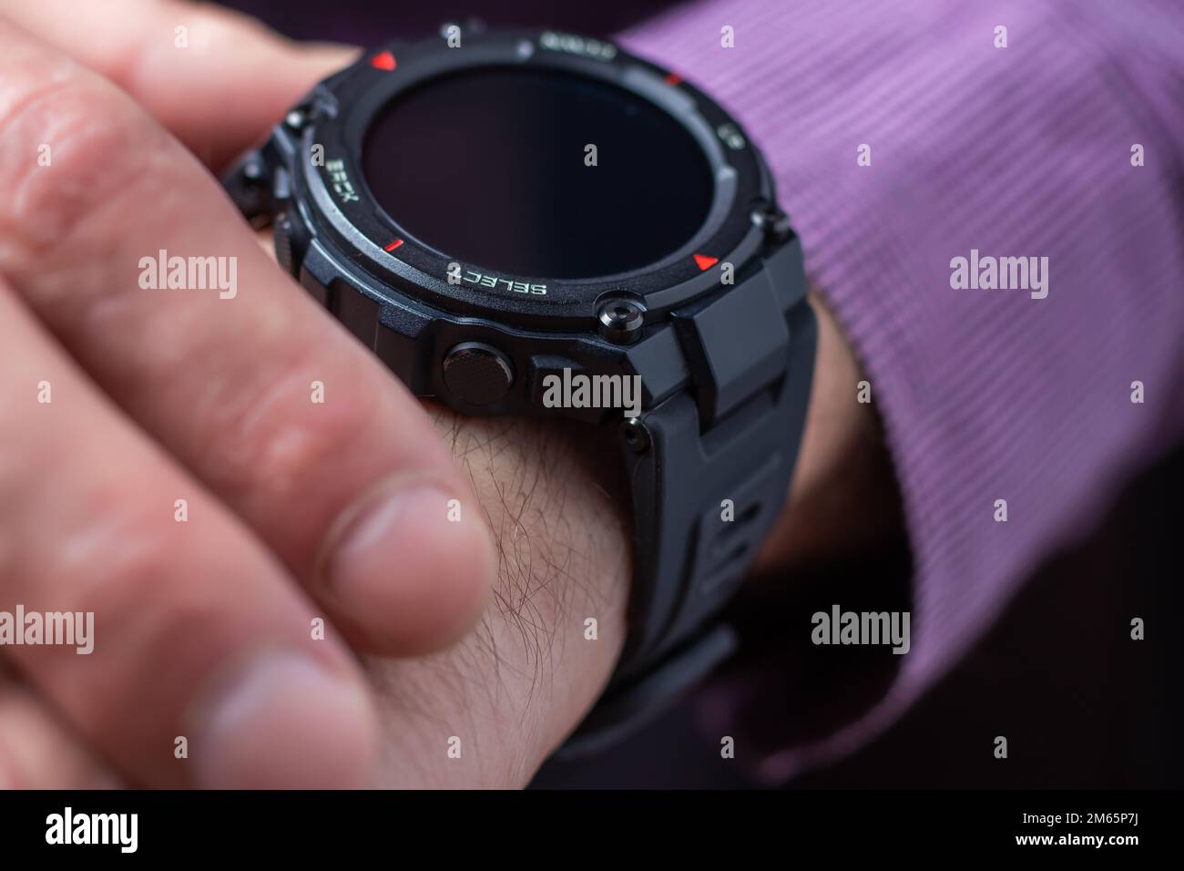 Man hand use smartwatch. Modern gadget that lets you always stay connected to internet Stock Photo