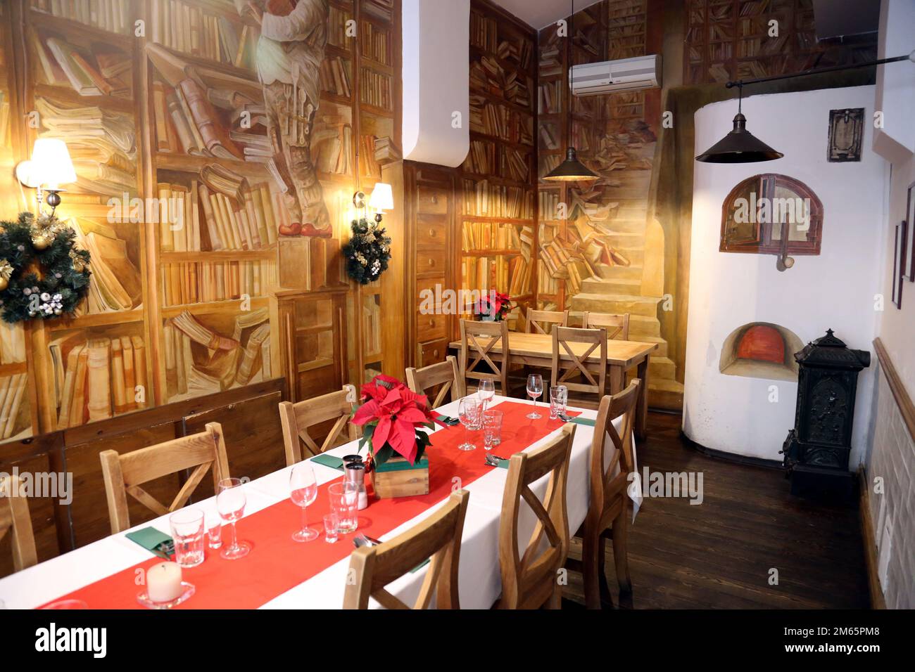 Cracow. Krakow. Poland. Setup and decoration of the traditional style restaurant interior. Stock Photo