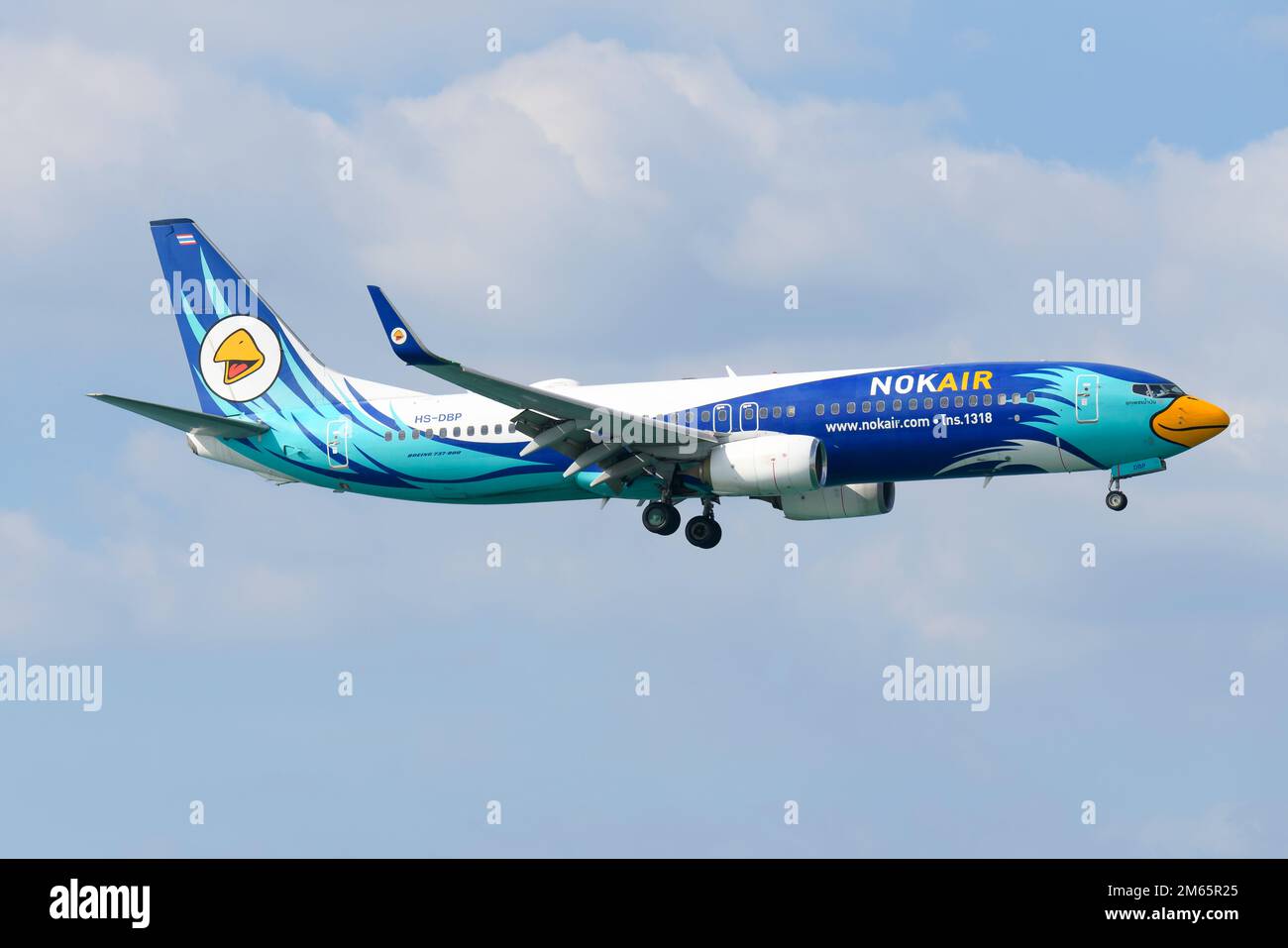 Nok Air Boeing 737 aircraft flying. Airplane 737-800 of NokAir Thailand (Nok Air Thailand). Stock Photo