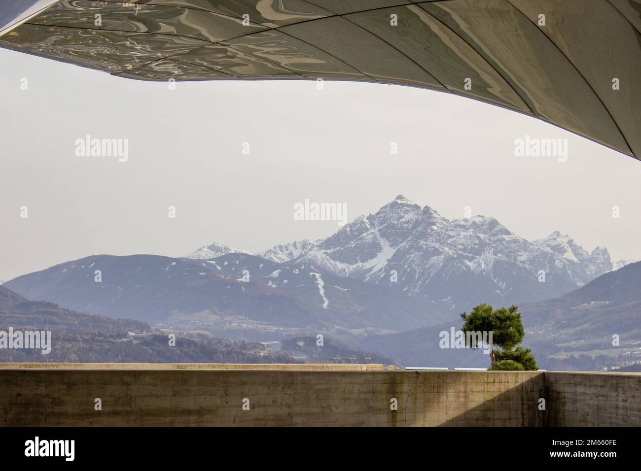 View of mountains range from the Hungerburg station with people looking