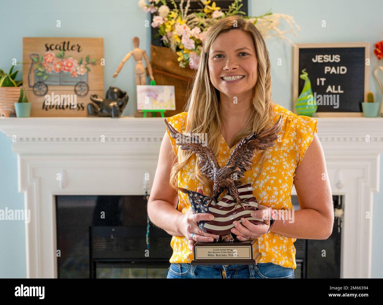 Rachel Young poses with her 512th Airlift Wing 2021 Spouse of the Year
