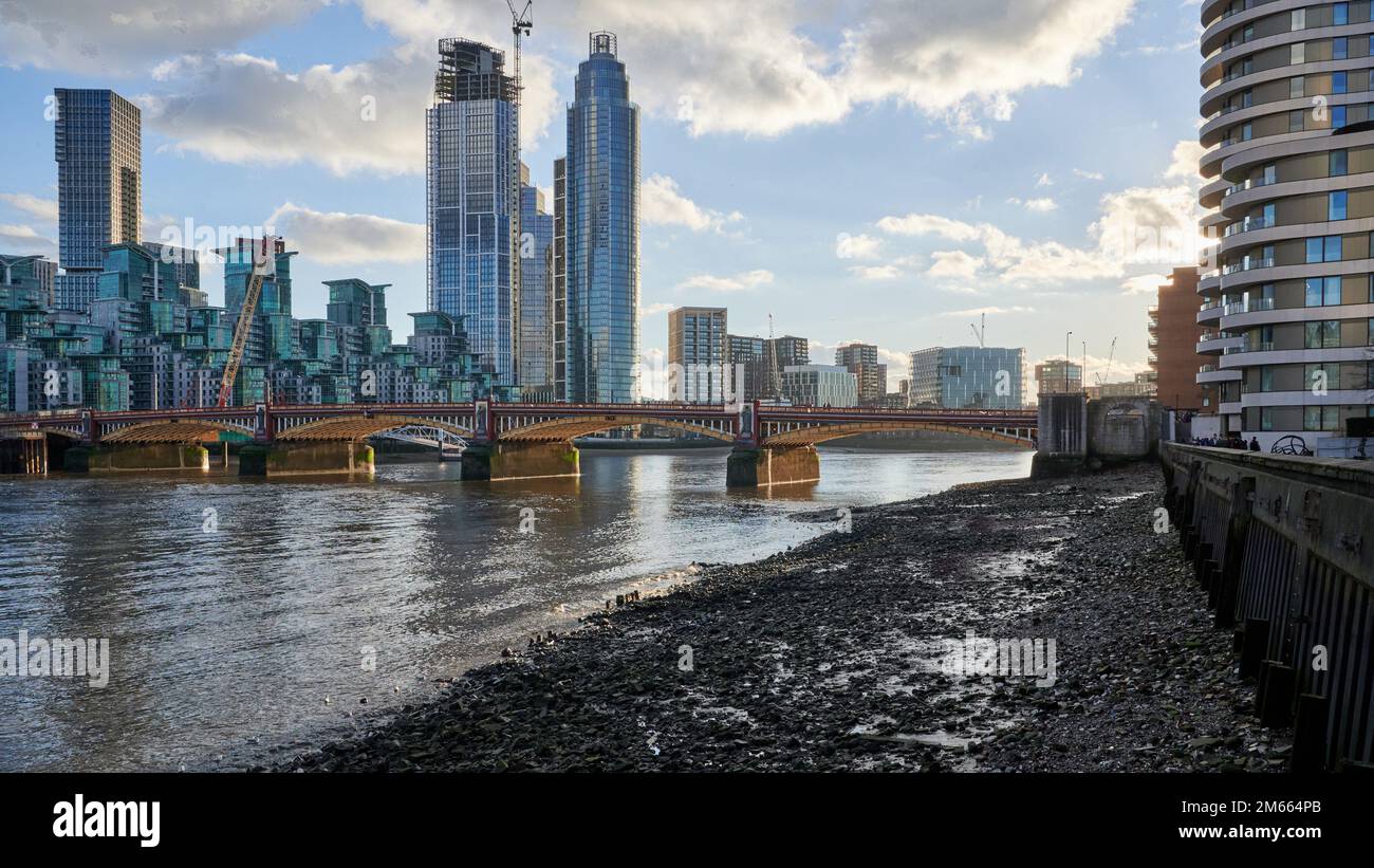 View of St George's wharf construction development over vauxhall bridge london and river thames at low tide Stock Photo